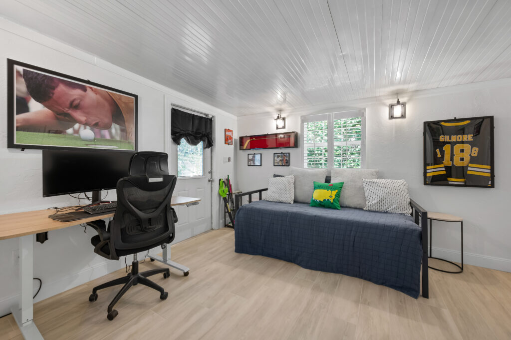 Fourth bedroom/office. Two twin trundle beds. Walks out to putt putt.